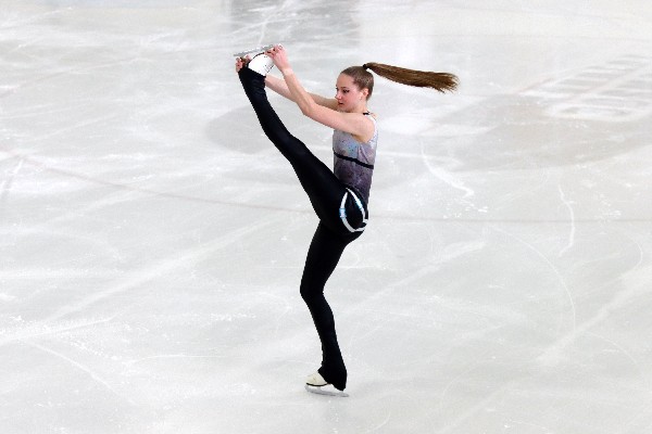 Figure skater performing an upright spin